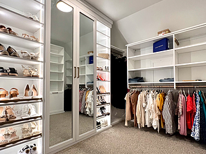 Large Walk-in Closet with Slanted Ceilings